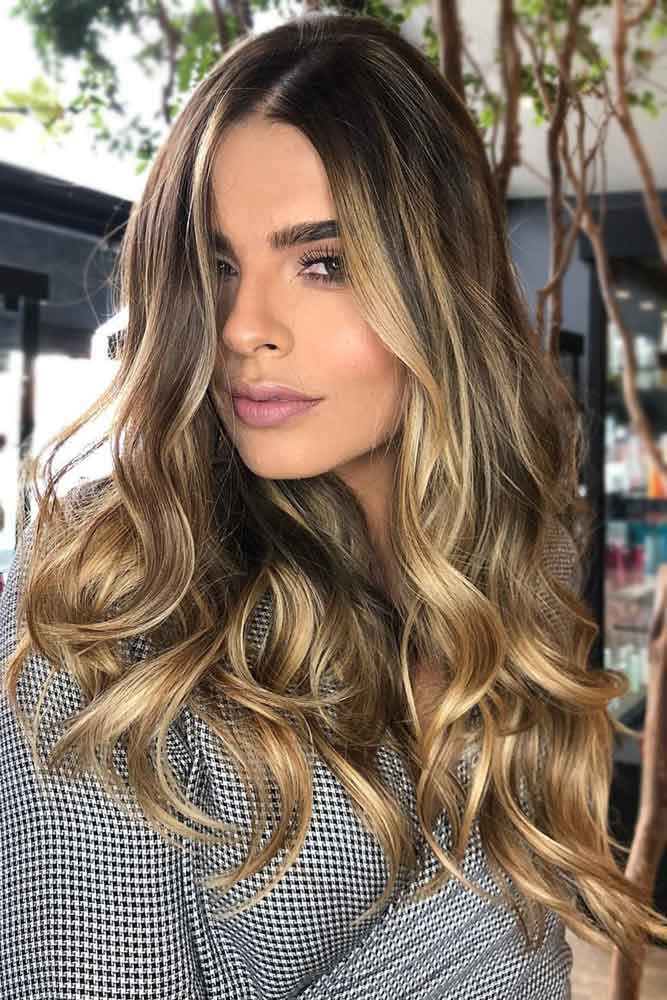 brunette-hair-ideas-layered-wavy-long-blonde-highlights