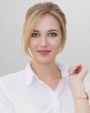 Aleksandra Sluzhava, multi-method hair extension specialist at Hera Hair Beauty Singapore